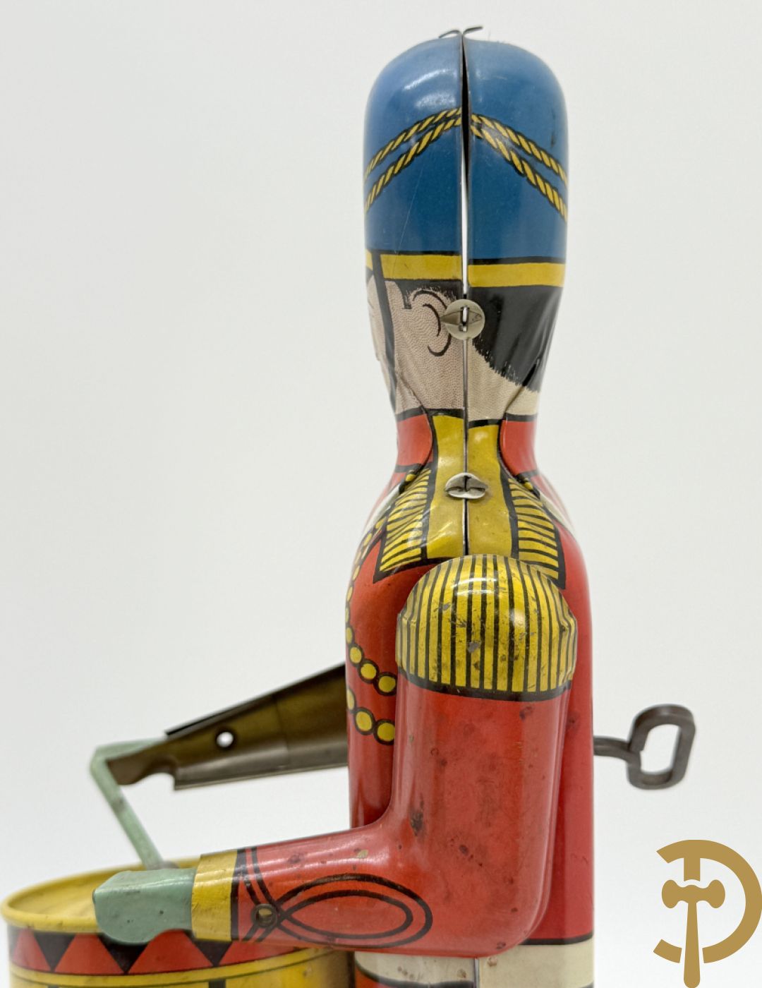 Antieke Engelse speelgoedtrommelaar, Drum Major made by Wolvering supply by Pittsburgh
