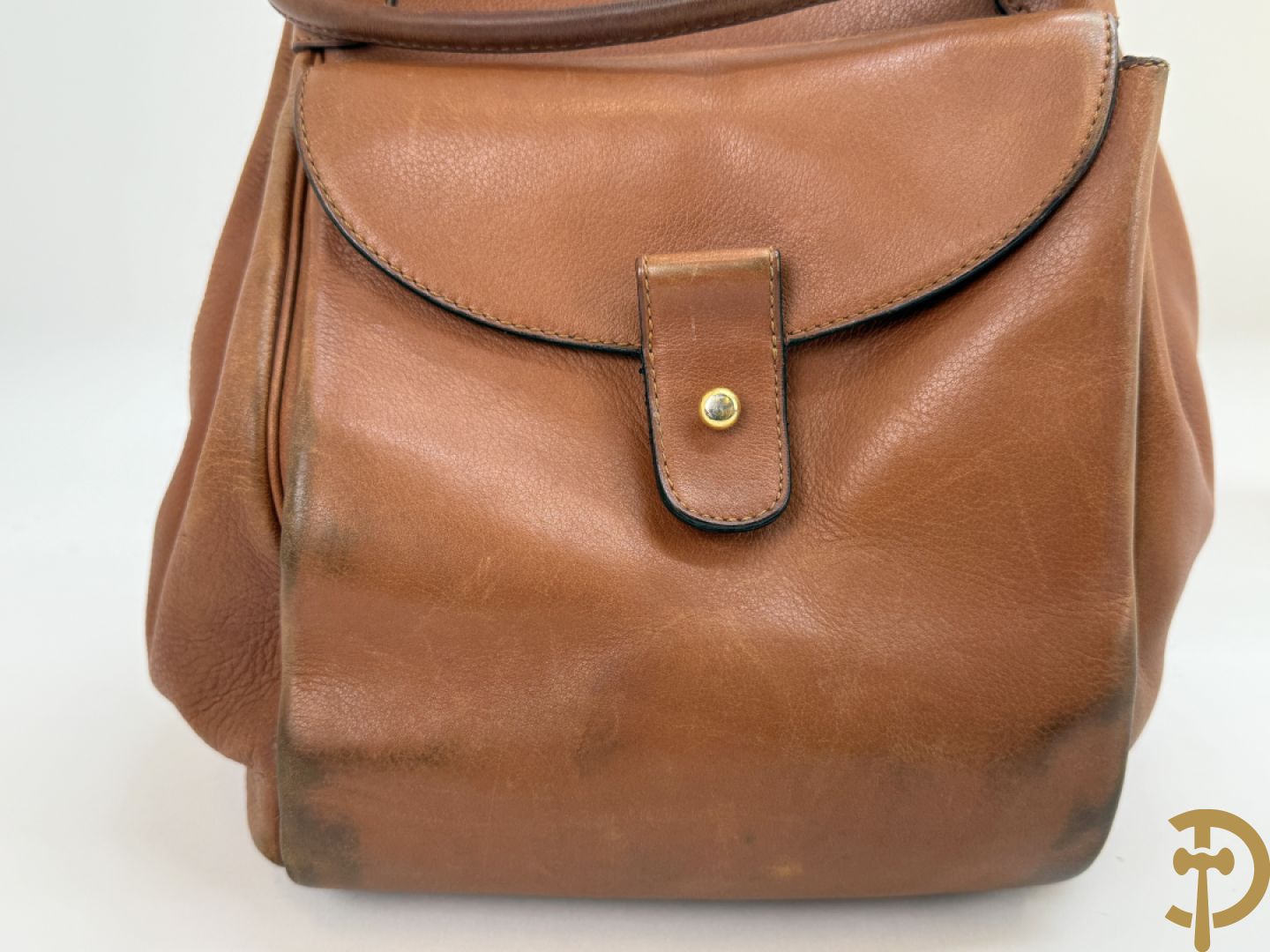 Bruin lederen handtas Delvaux + cognac lederen schoudertas Equivoque Delvaux