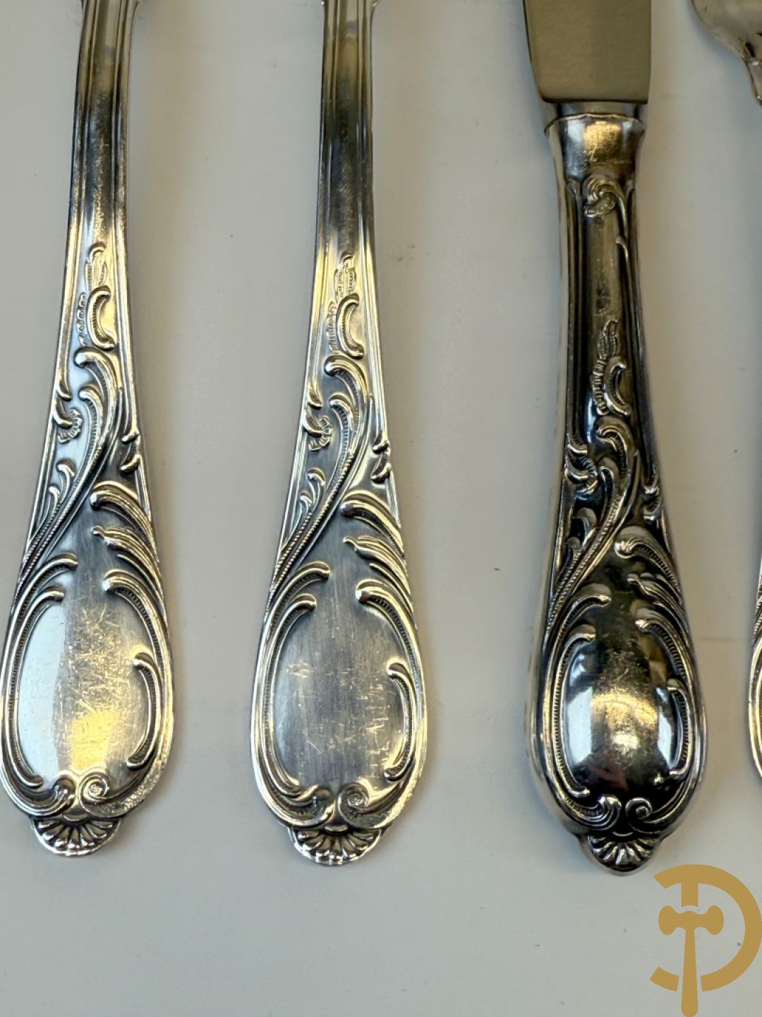 Verzilverd Louis XV bestek in schrijn : 10 reeksen en losse stukken