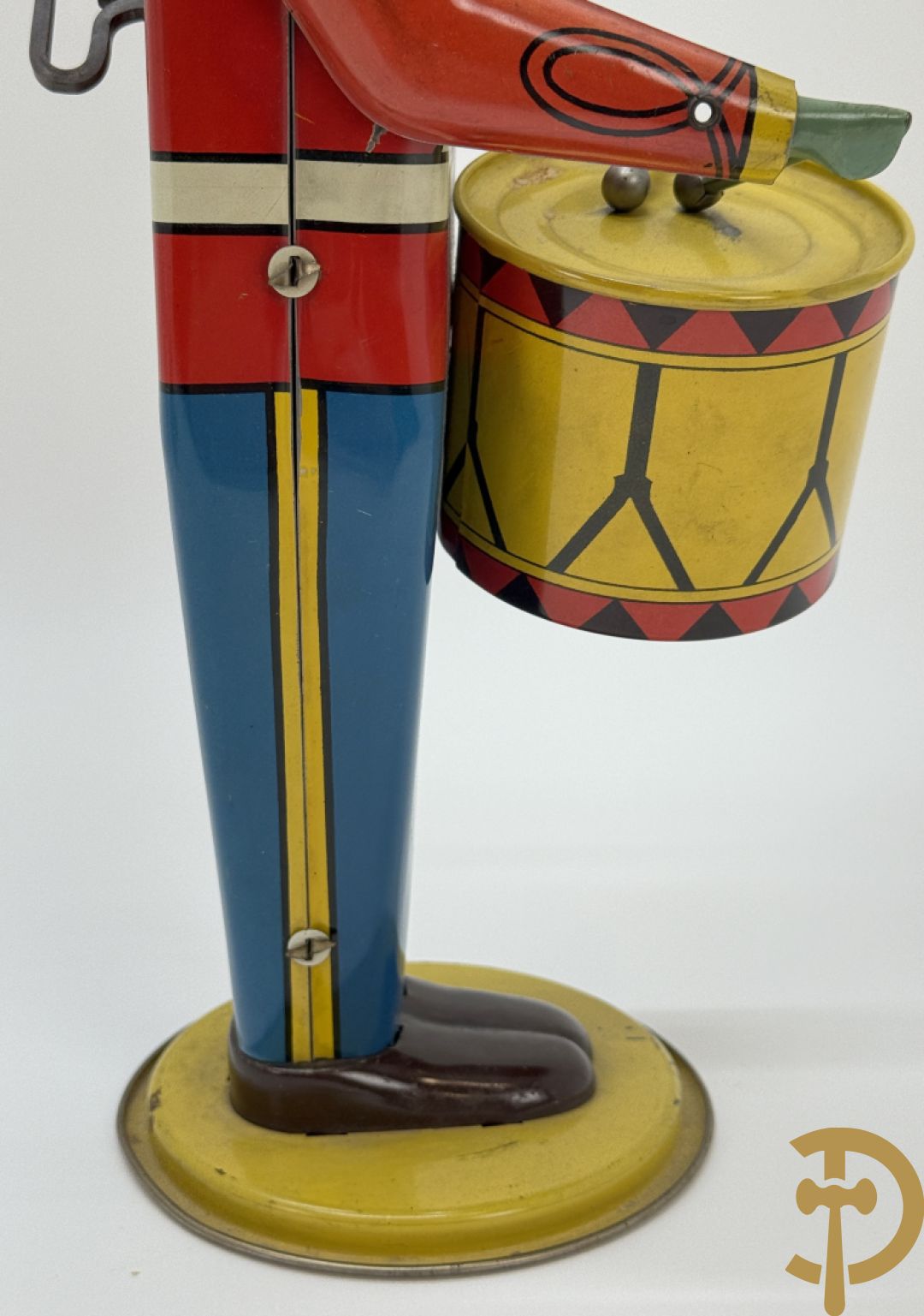 Antieke Engelse speelgoedtrommelaar, Drum Major made by Wolvering supply by Pittsburgh