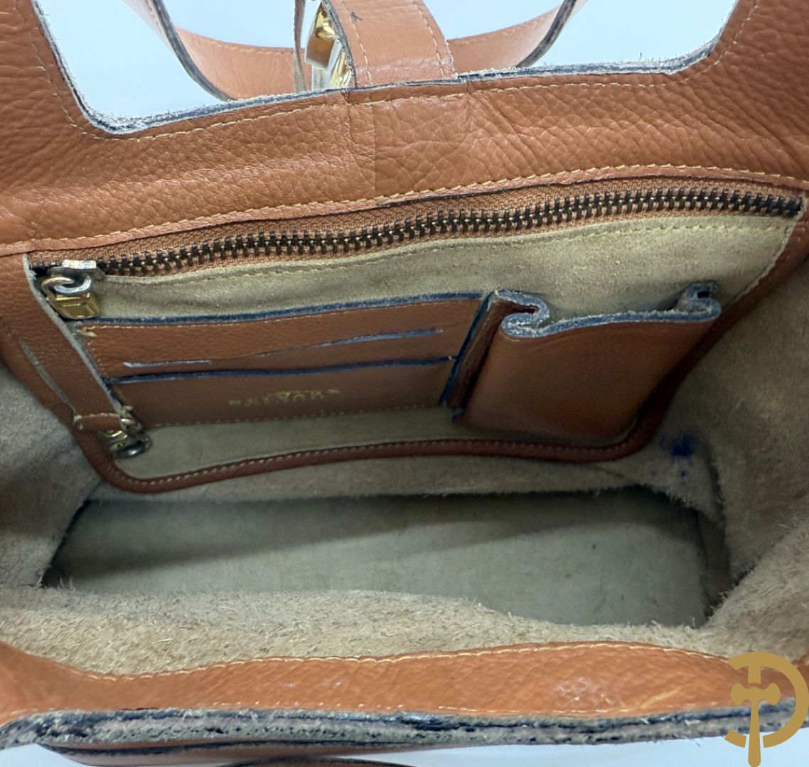 Schoudertas Delvaux met koperen boekel, model Trotteur