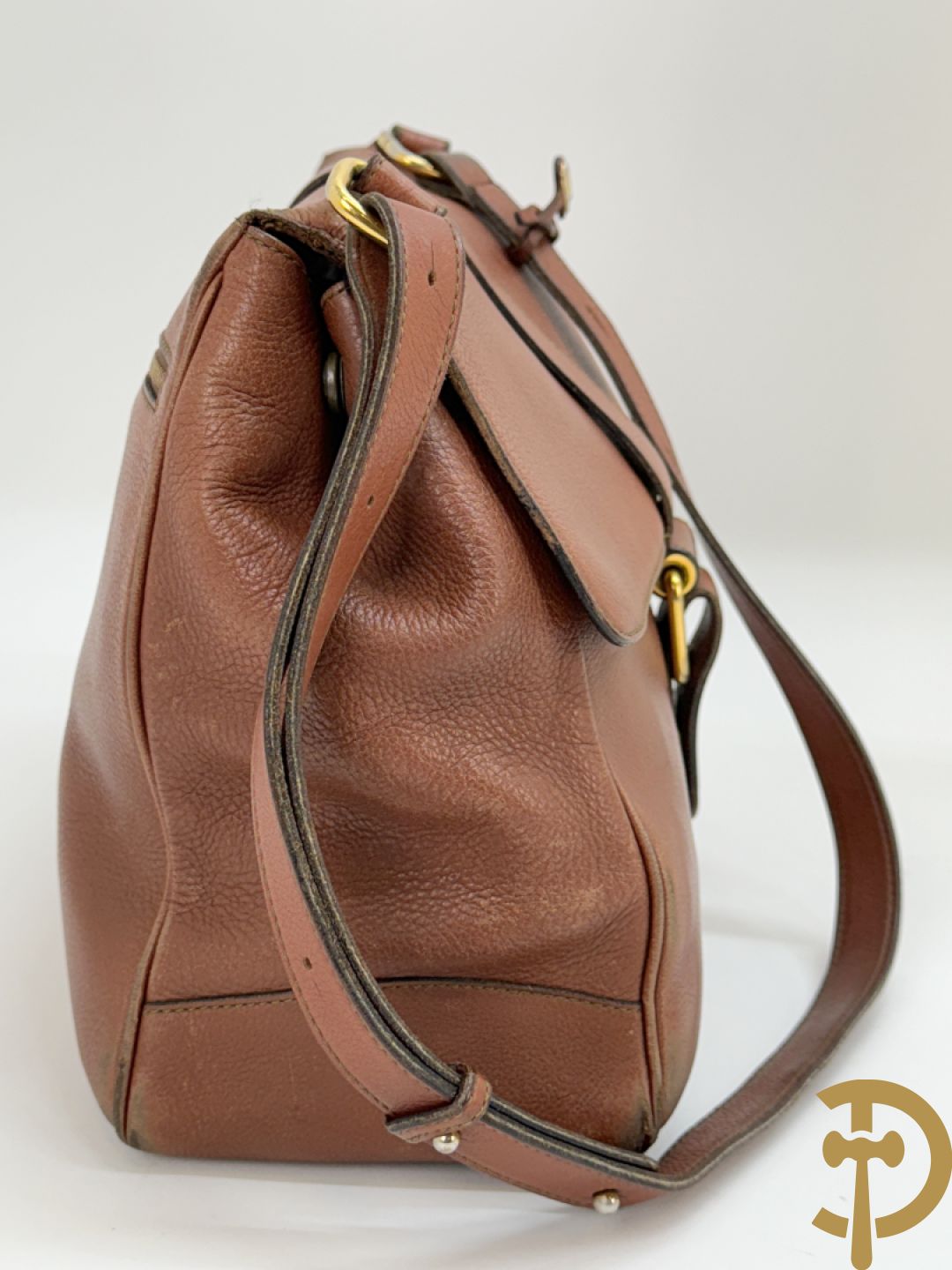 Bruin lederen handtas Delvaux + cognac lederen schoudertas Equivoque Delvaux