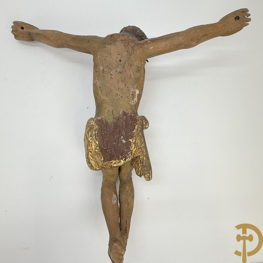 Twee houtgesculpteerde en gepolychromeerde corpussen