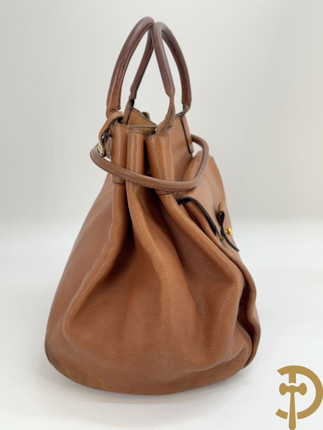 Bruin lederen handtas Delvaux + cognac lederen schoudertas Equivoque Delvaux