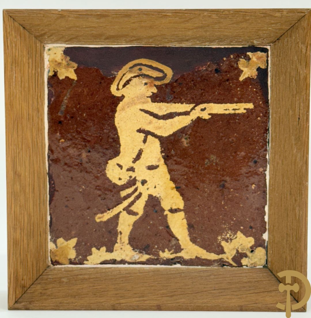 Paar 18e Vlaamse tegels met jager en hond ingelijst in kader