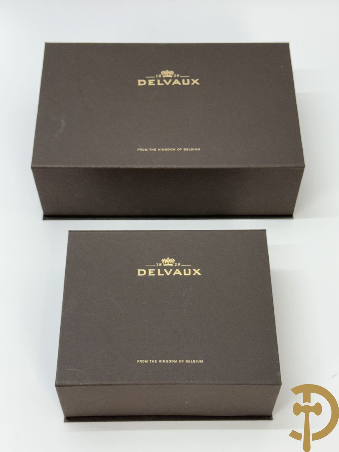 Twee vintage Delvaux handtassen (zwart en bruin) + geldbeugel + lege doosjes