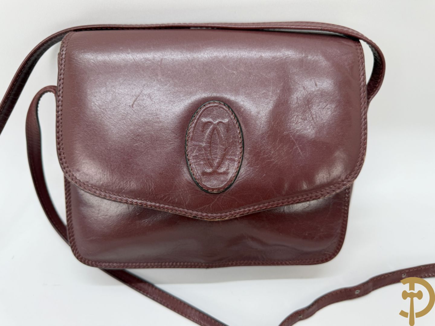 Bordeaux lederen aktentas Cartier + handtas Cartier