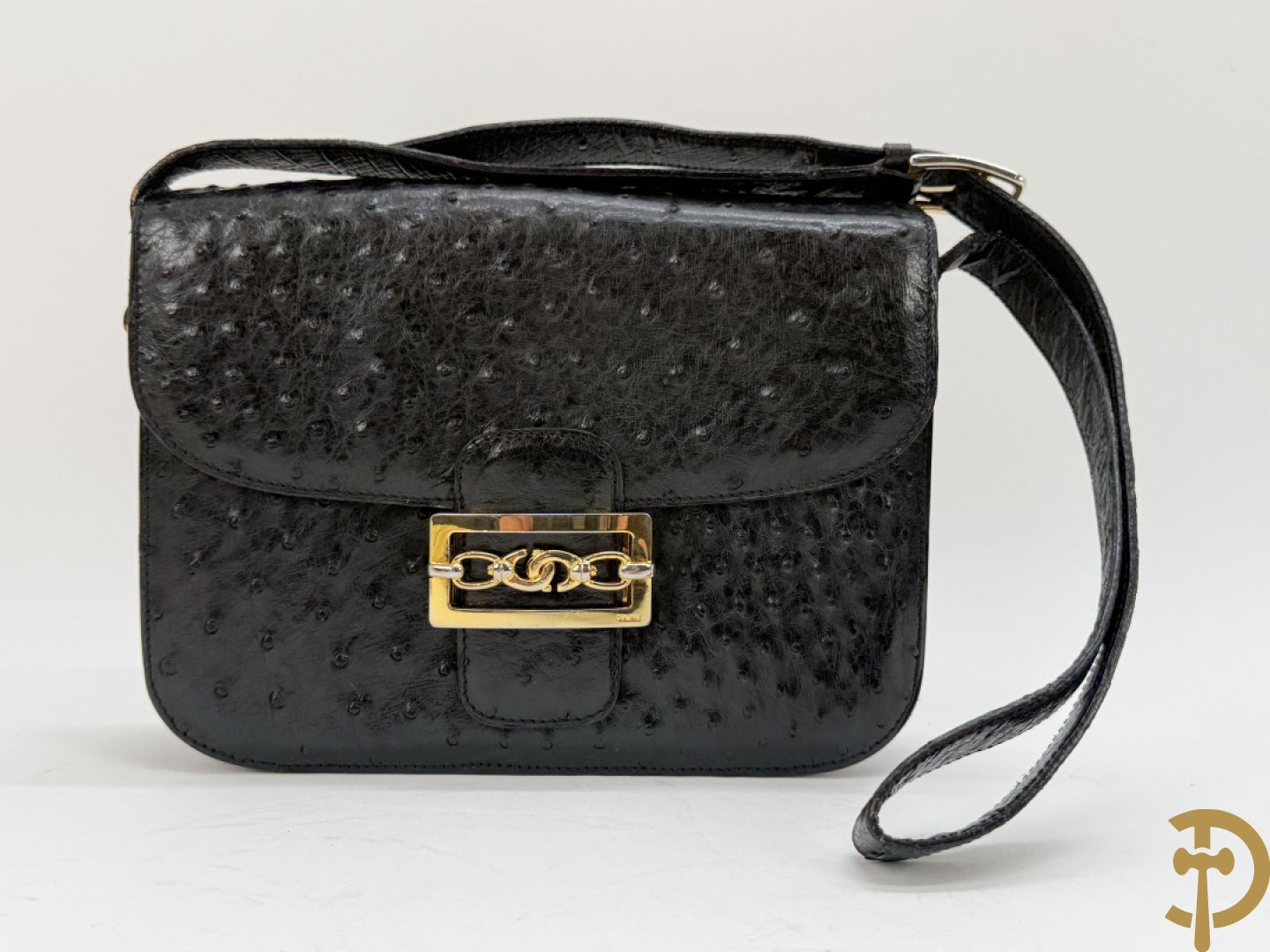 Vintage handtas in struisvogelleder met koperen ornament, Celine Paris, met bijhorende stofzak