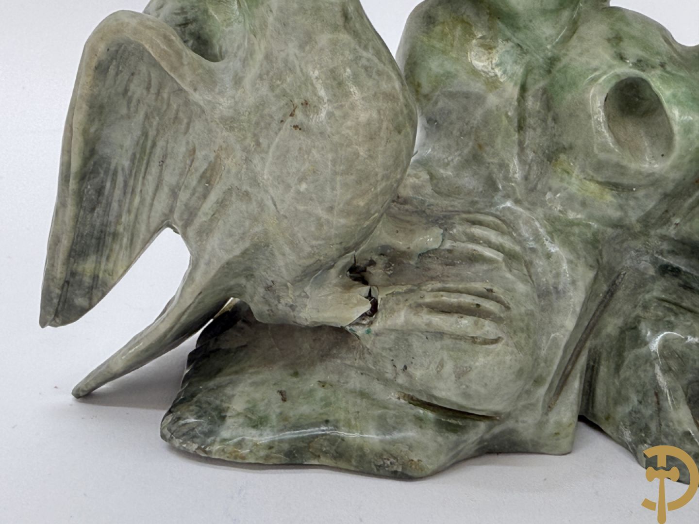 Paar Aziatische sculpturen met fenixen en pioenrozen