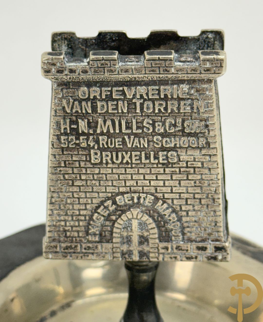 Vier luciferhouders in verzilverd metalen met reclame opschriften van Wiskeman (2 x) , Orfeverie Van Den Torren en Orfeverie L. Haut