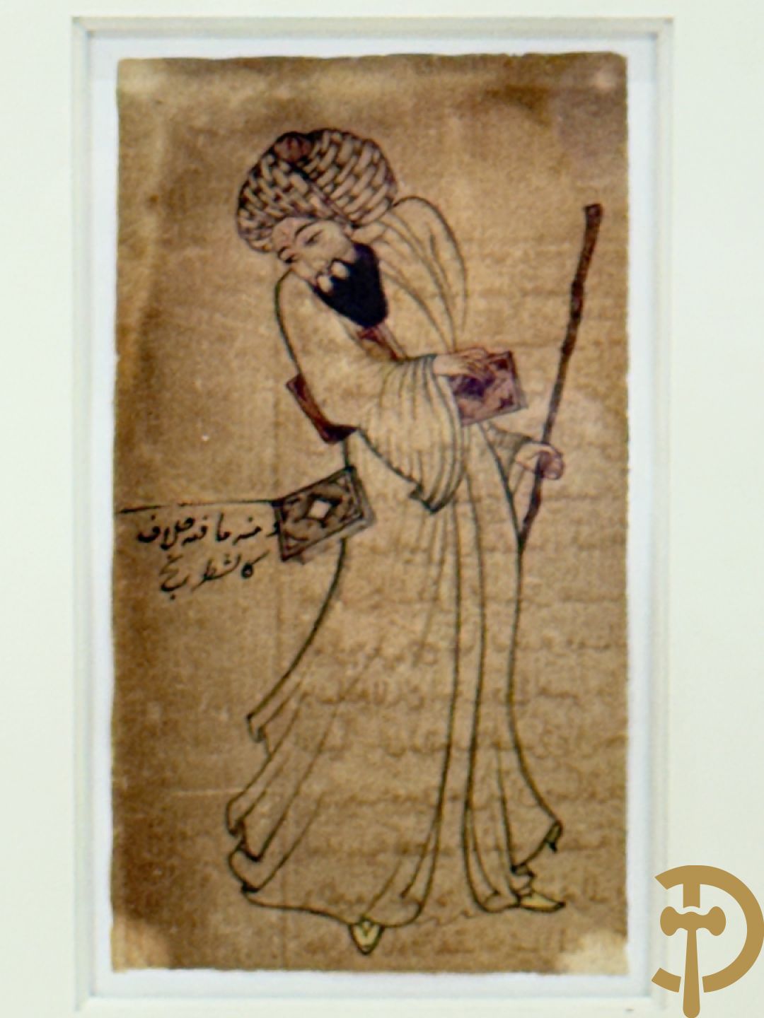 Oud manuscript van orientaalse wijsgeer met staf, waarschijnlijk Avicenna