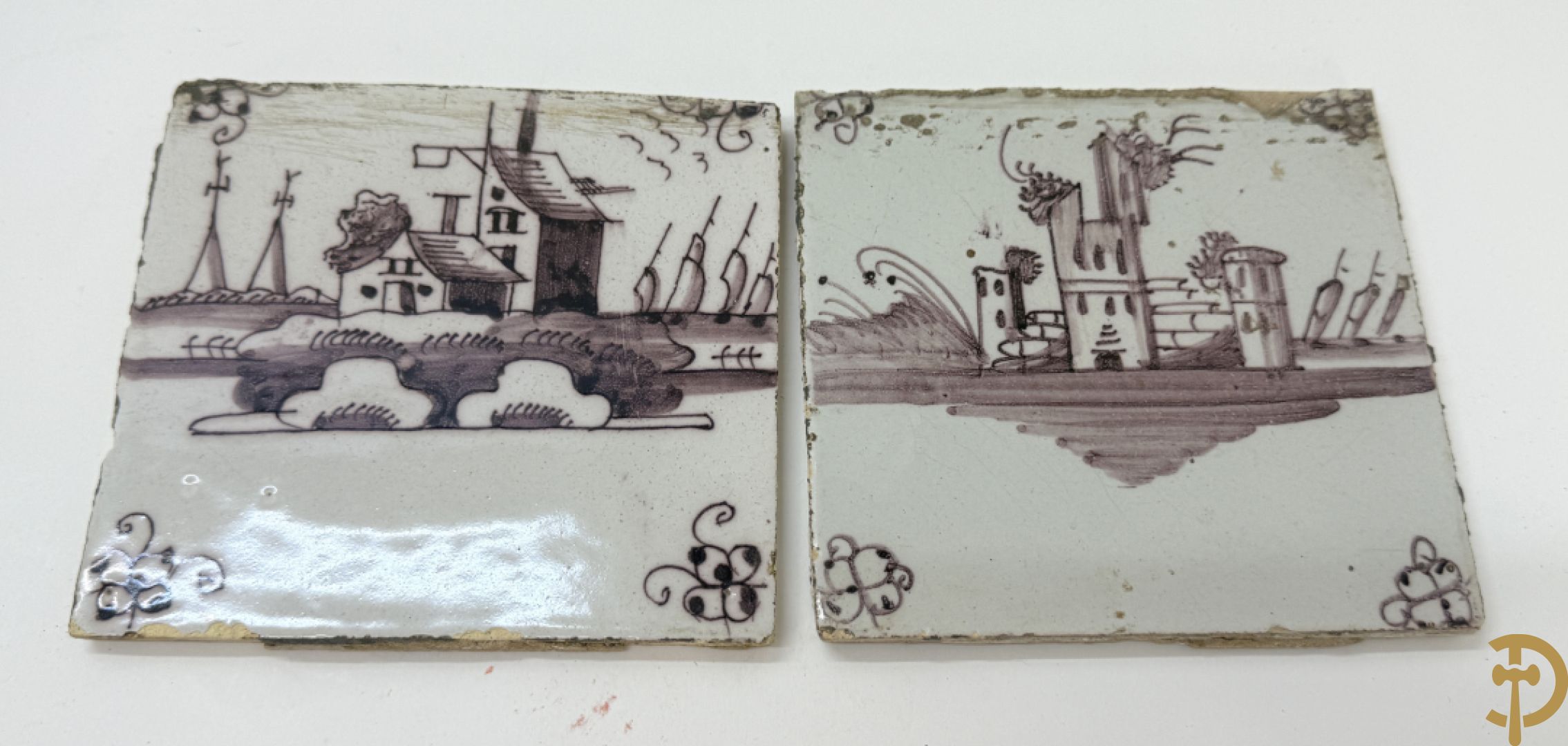 Verzameling zwart/witte Delftse tegeltjes met landschaps- en dierendecor