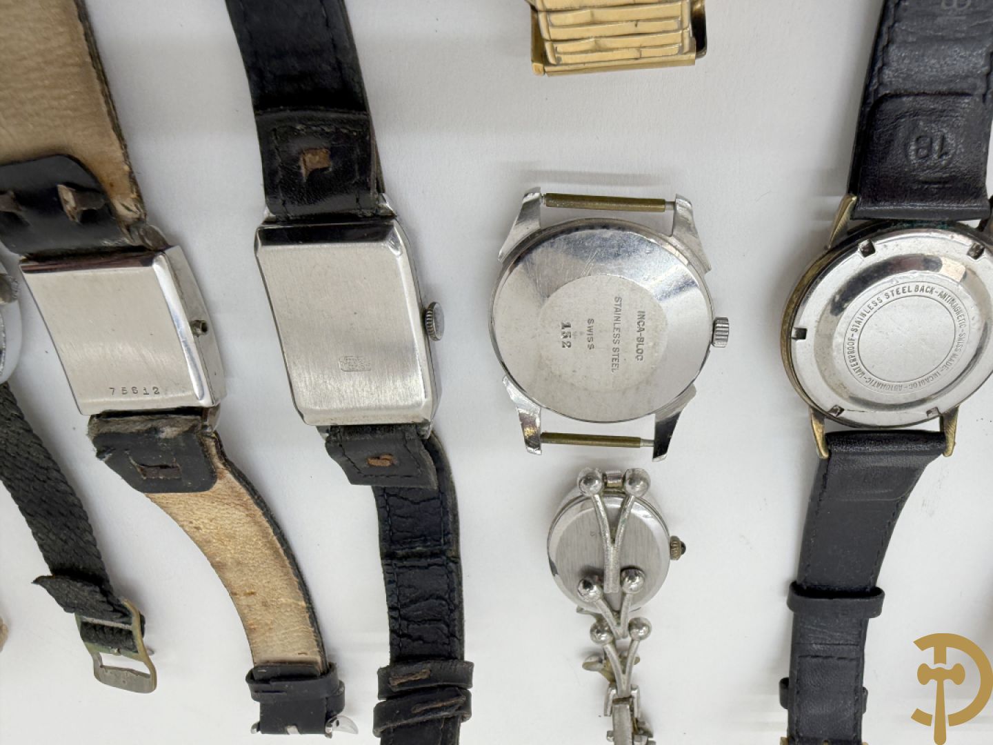 Zeventien vintage dames- en heren polsbandhorloges + 2 binnenwerken