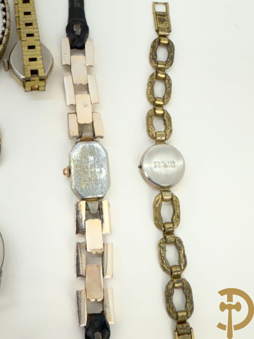 Zeventien vintage dames- en heren polsbandhorloges + 2 binnenwerken