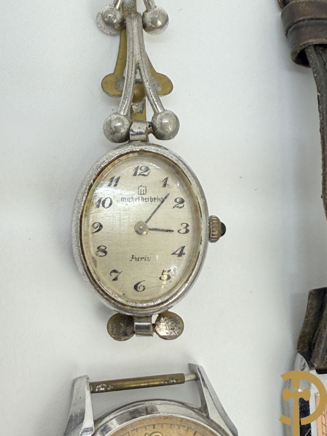 Zeventien vintage dames- en heren polsbandhorloges + 2 binnenwerken