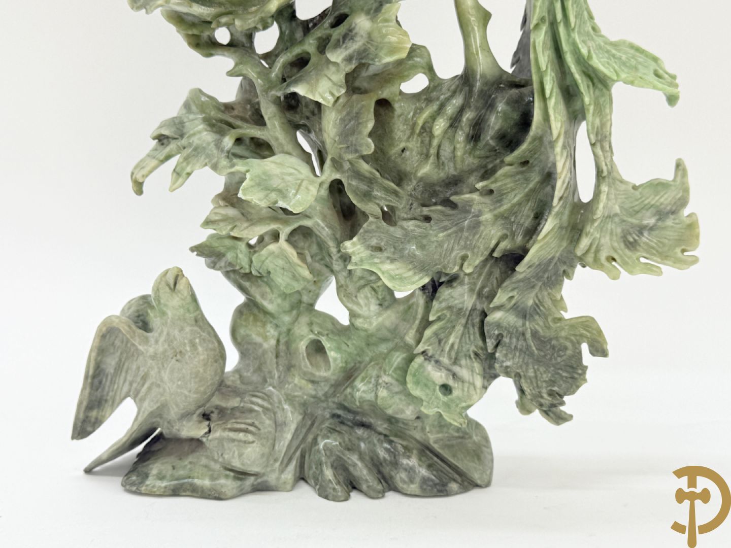 Paar Aziatische sculpturen met fenixen en pioenrozen