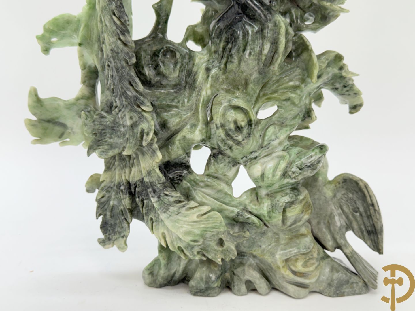 Paar Aziatische sculpturen met fenixen en pioenrozen