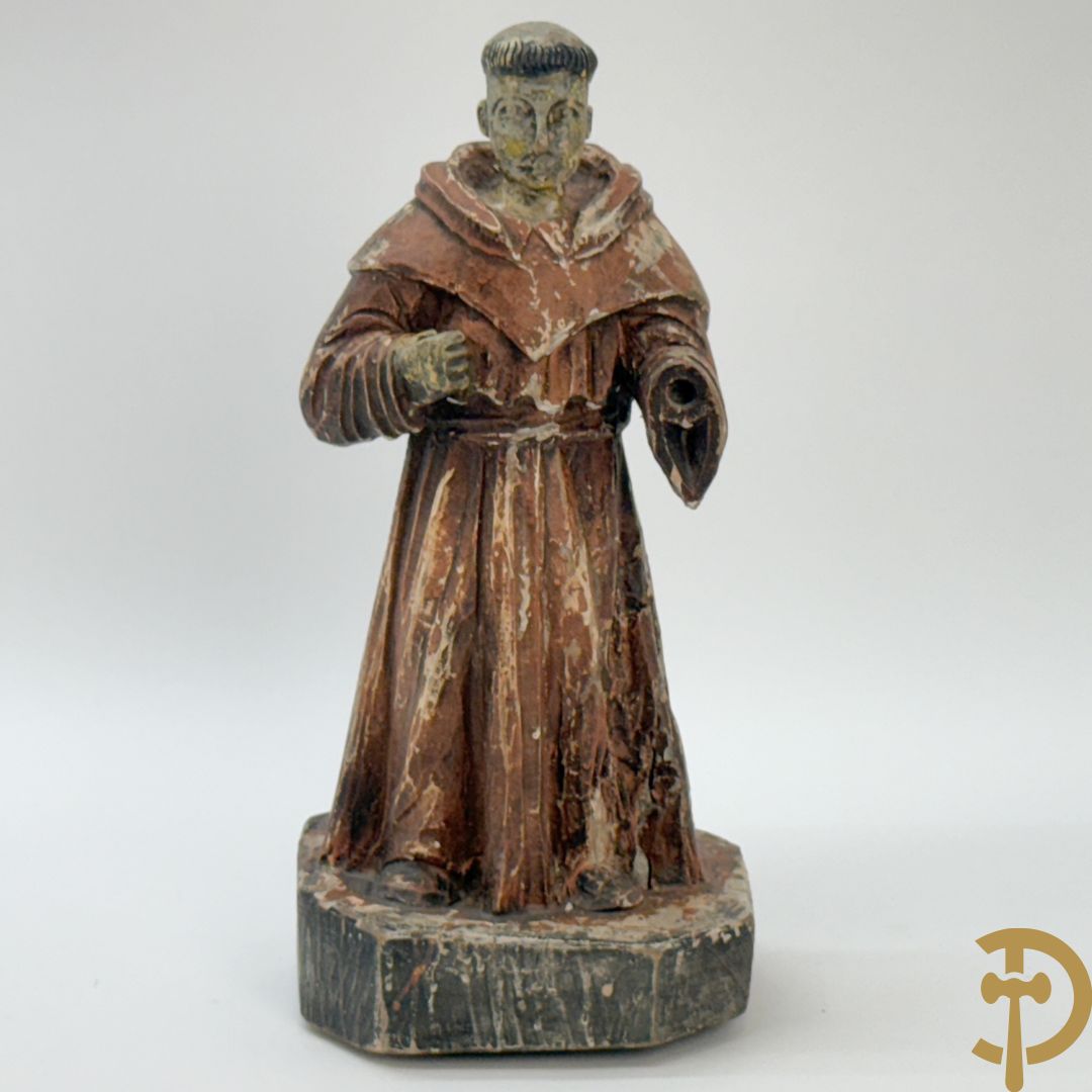 Volkse houtsculptuur van Sint Antonius