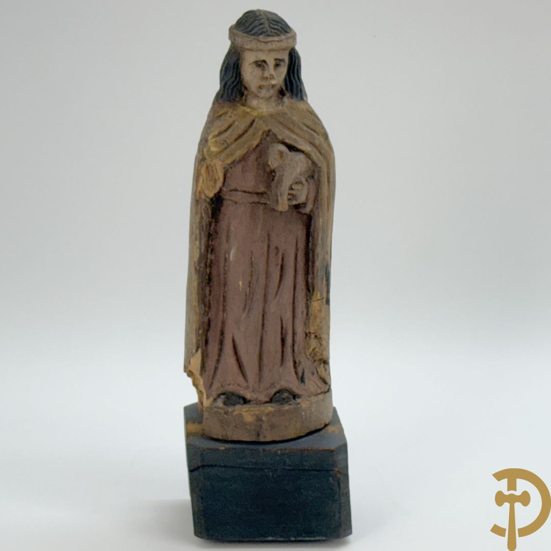 Volkse houtsculptuur van Heilige figuur met lam