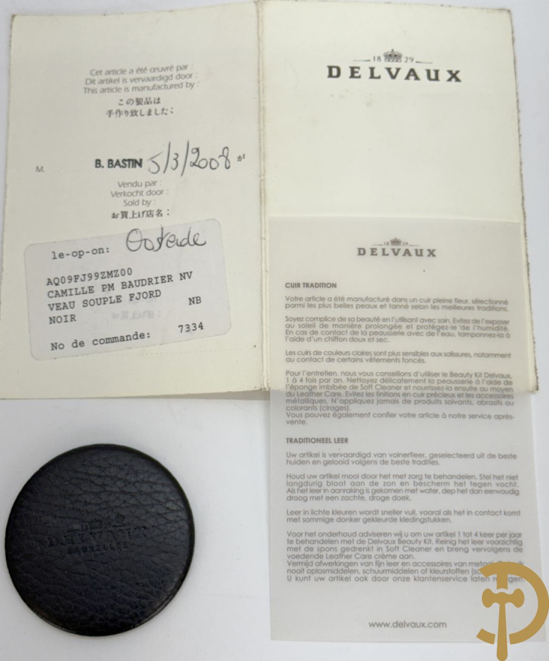 Bruine en zwart lederen handtas Delvaux + boek van Delvaux met documentatie