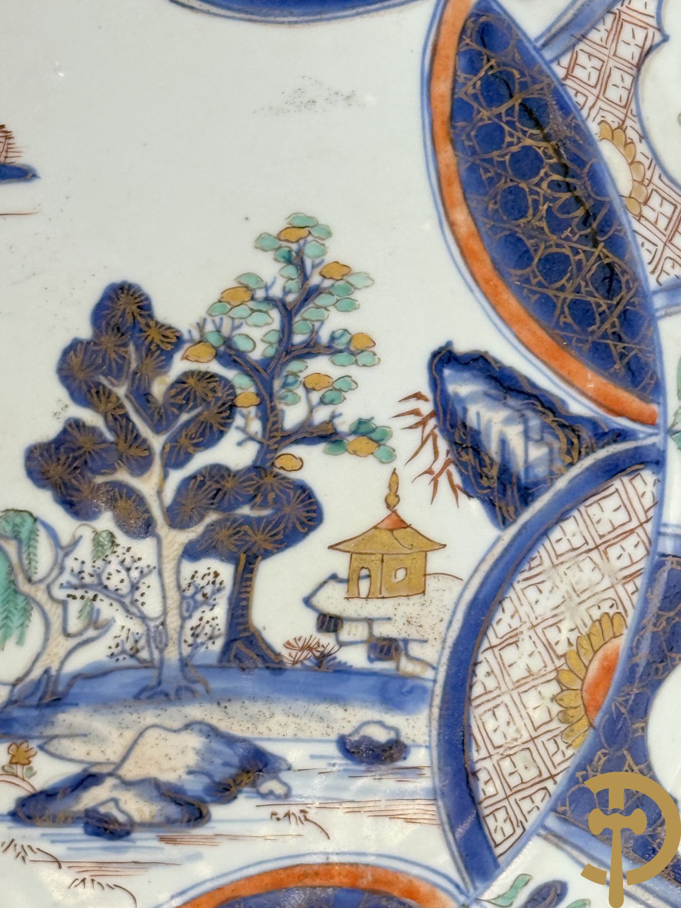 Chinees porseleinen Imari bord met landschapsdecor en bloemen