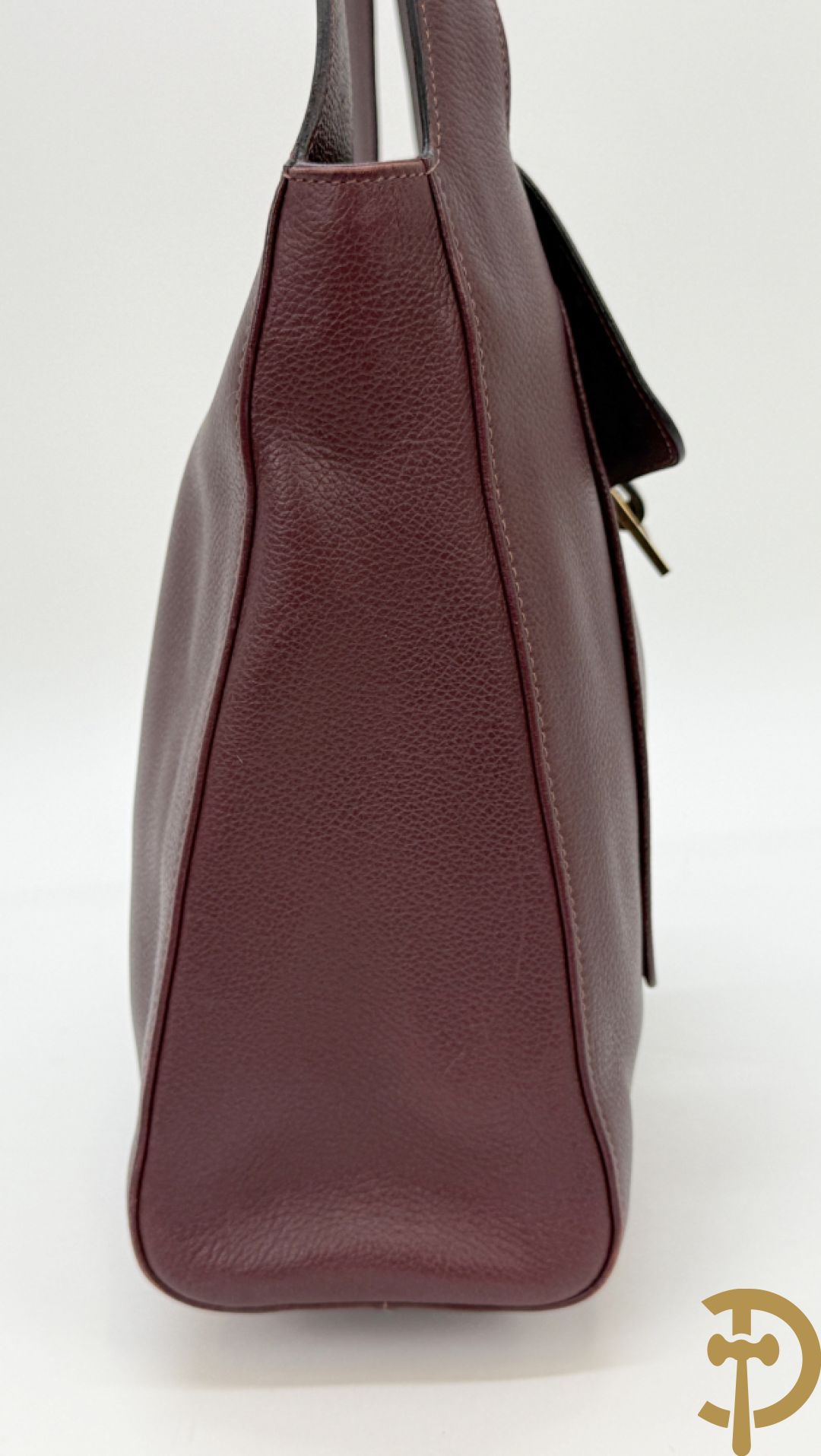 Mooi lederen auberginekleurige handtas Delvaux met bijhorende zak