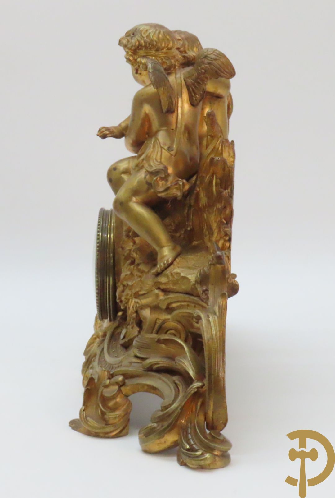Bronzen schouwklok bezet met 2 cupido