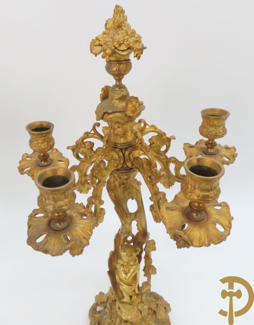 Bronzen schouwklok bezet met 2 cupido