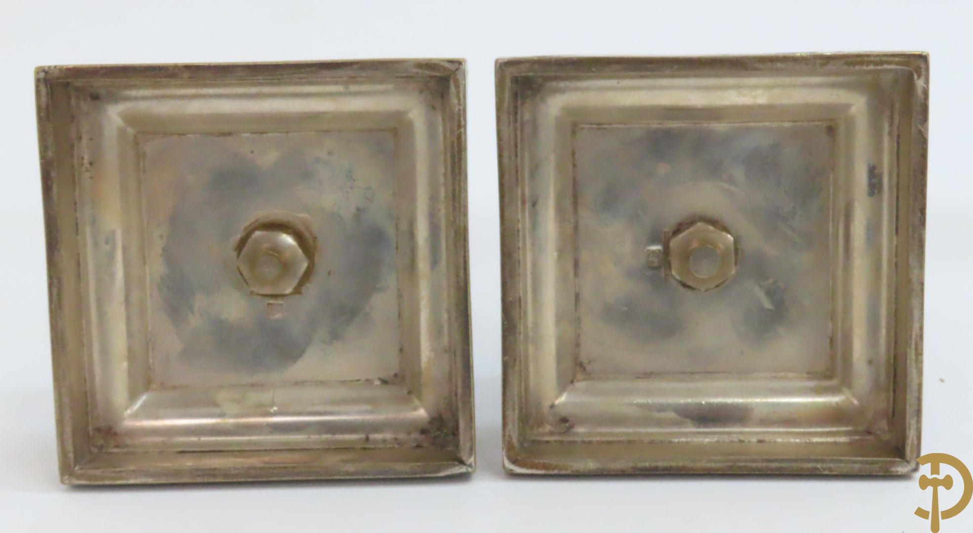 Zes paar verzilverde kandelaars