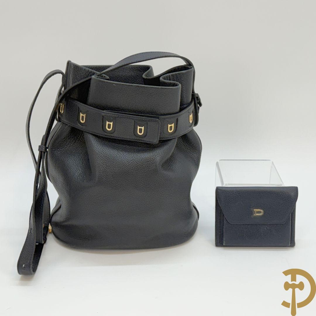 Blauw gekorreld lederen schoudertas model Le Calicot en openklapbare geldbeugel, Delvaux,