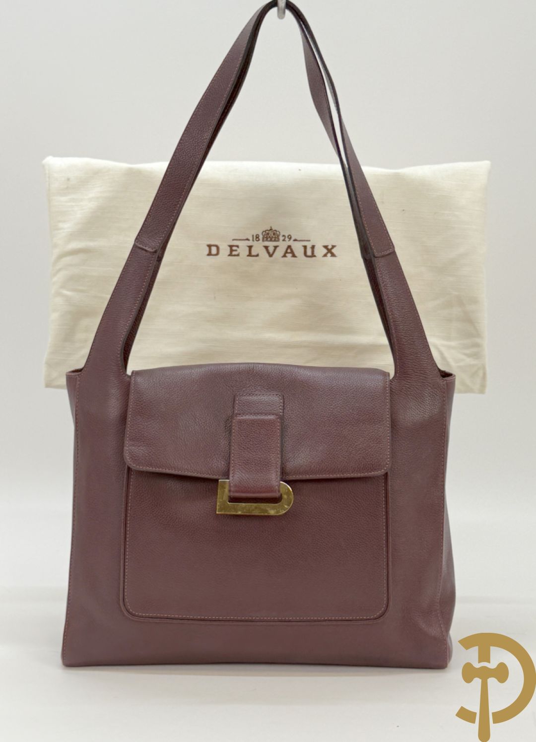 Mooi lederen auberginekleurige handtas Delvaux met bijhorende zak