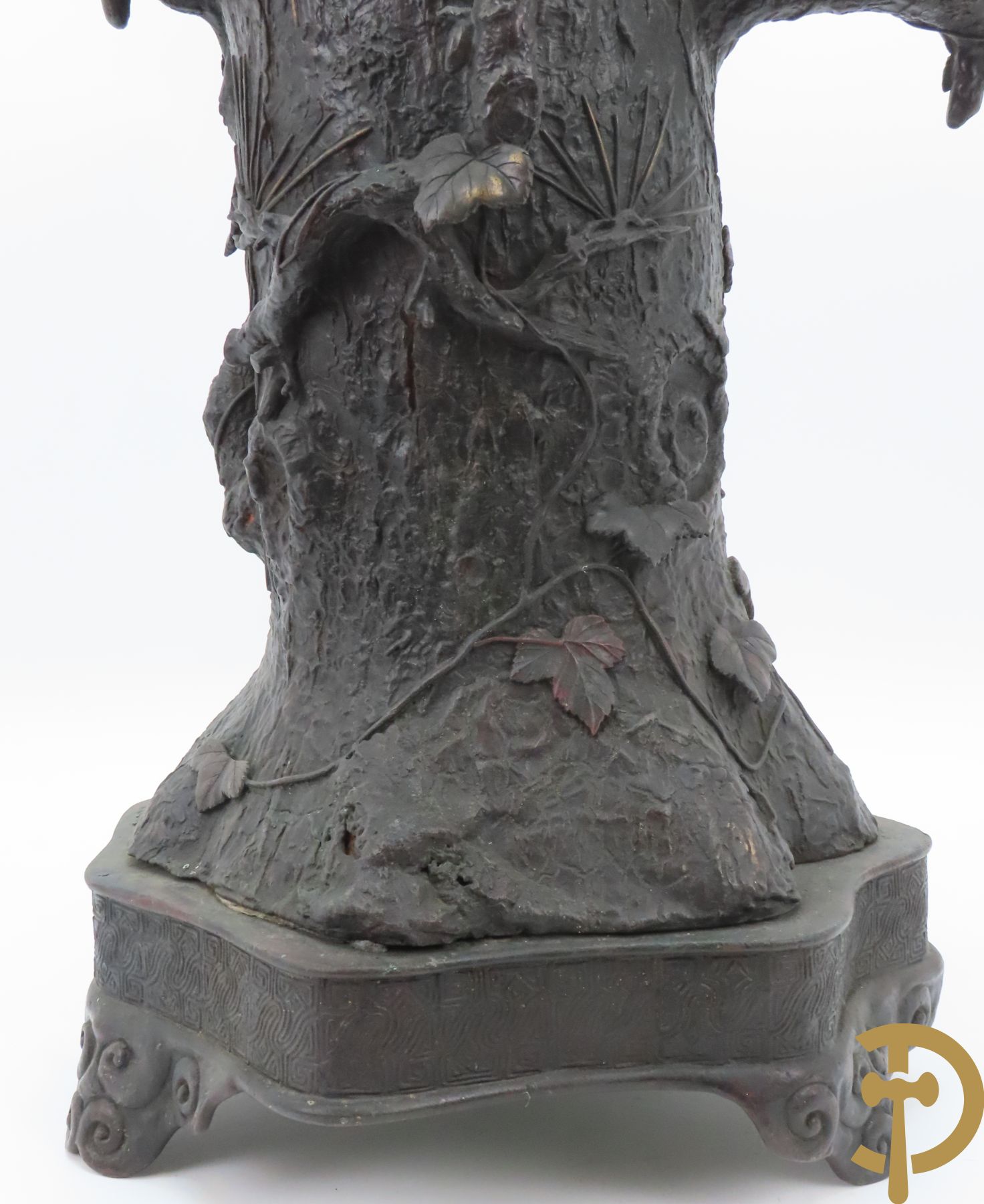 Bronzen ornament van boomstronk met takken en adelaar