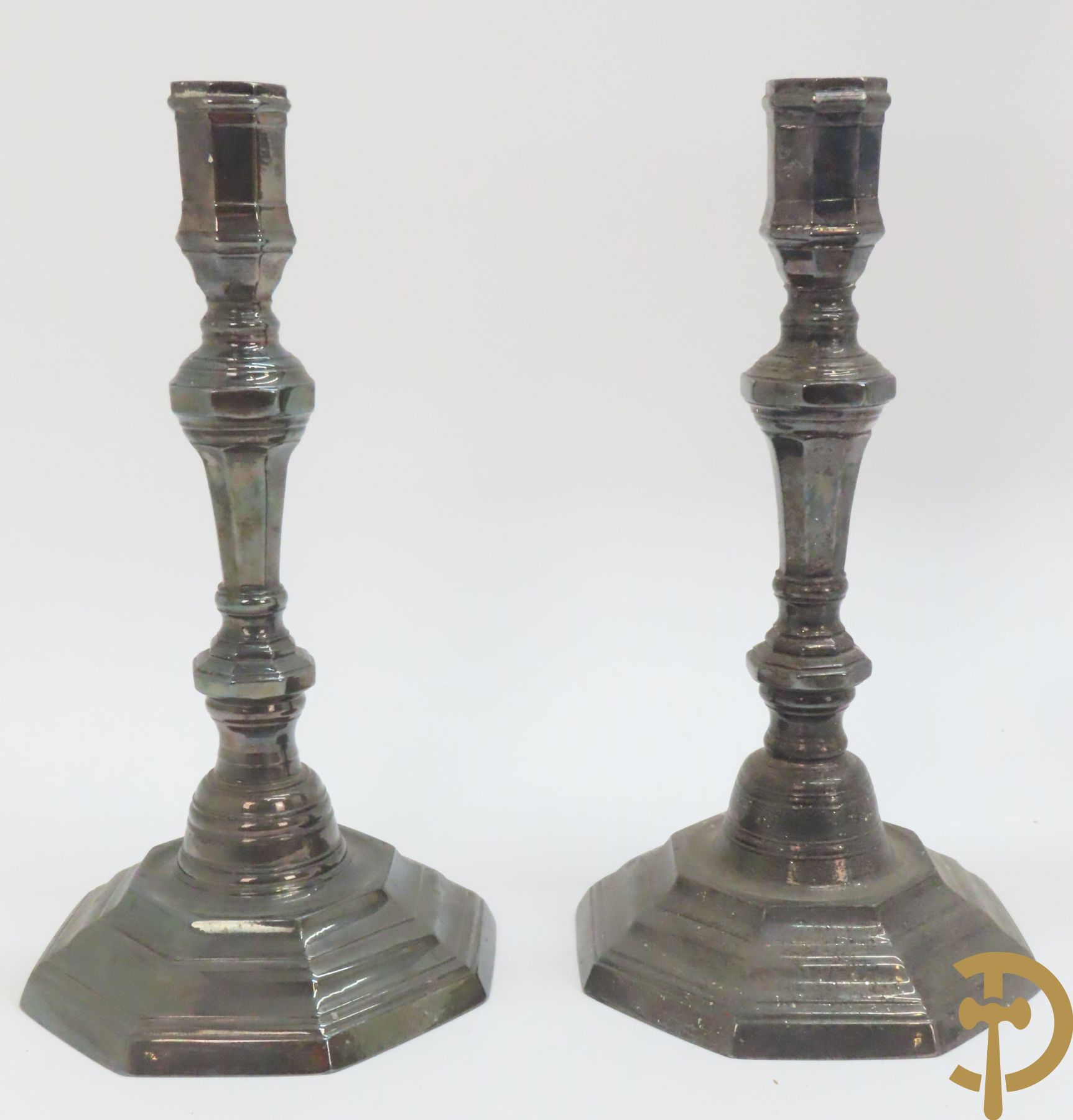 Zes paar verzilverde kandelaars