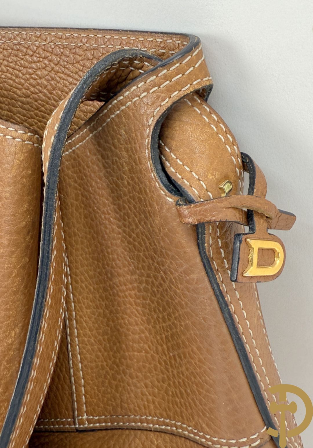 Cognac lederen schoudertas Faust Delvaux met bijhorende stoffen zak