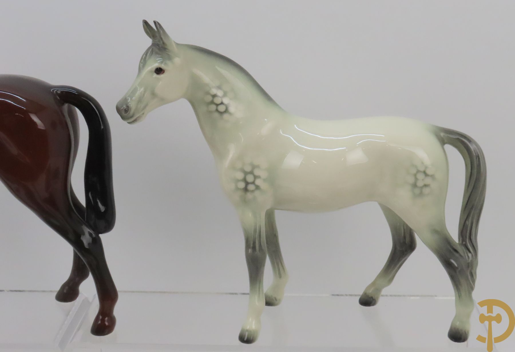 Twaalf porseleinen paarden, onderaan getekend Goebel West Germany