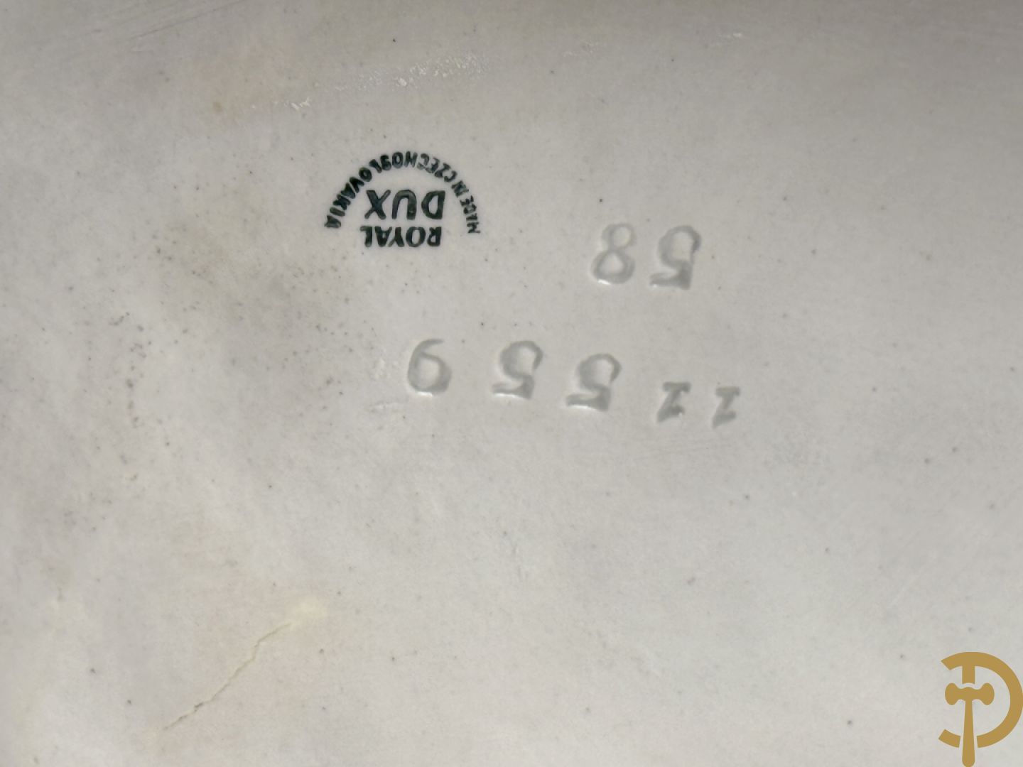 Royal Dux beeld van smid met vrouw en kind, nummer 11559