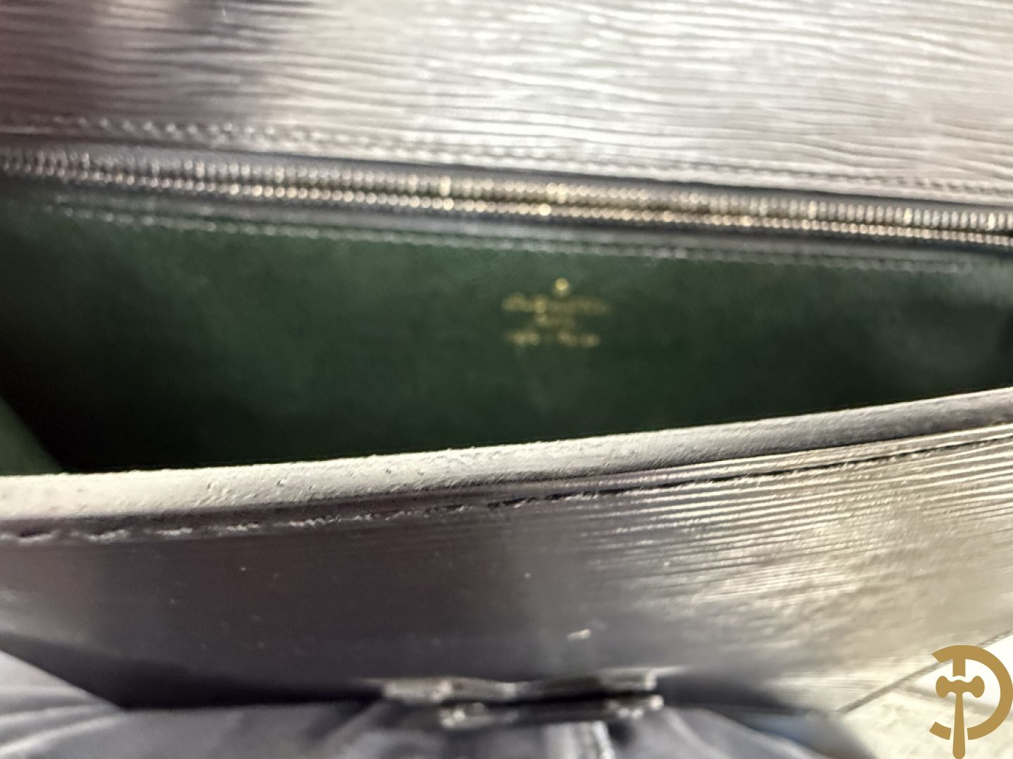 Lederen Louis Vuitton clutch + zwart lederen portefeuille Louis Vuitton