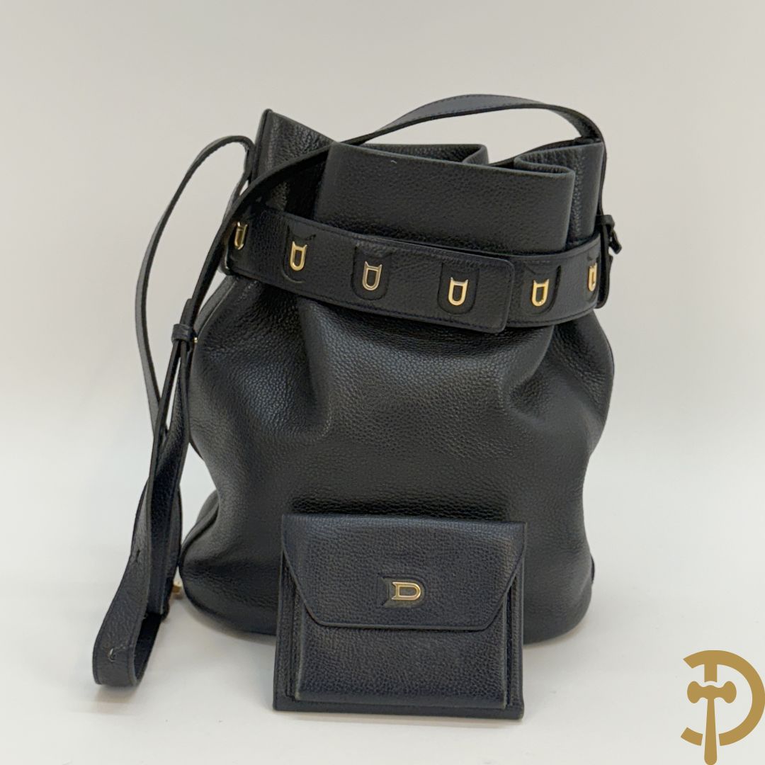 Blauw gekorreld lederen schoudertas model Le Calicot en openklapbare geldbeugel, Delvaux,