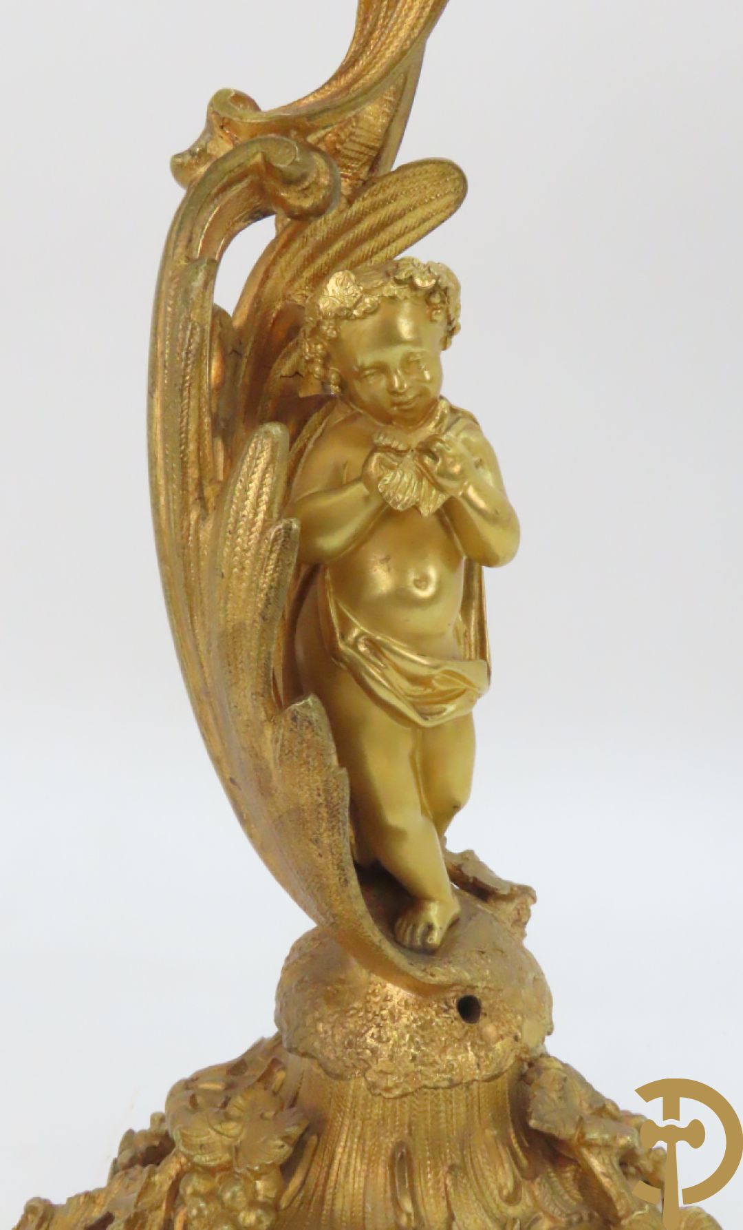 Bronzen schouwklok bezet met 2 cupido