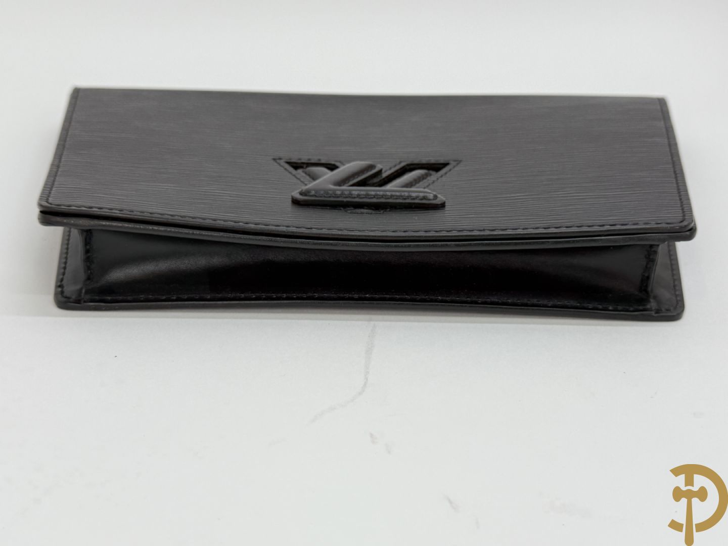 Lederen Louis Vuitton clutch + zwart lederen portefeuille Louis Vuitton