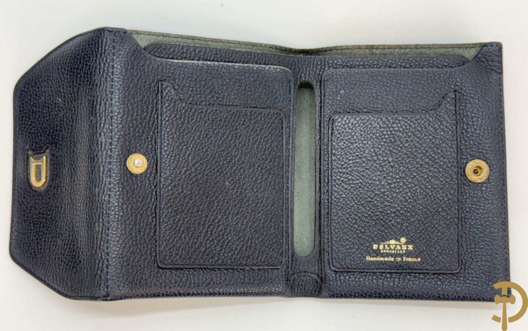 Blauw gekorreld lederen schoudertas model Le Calicot en openklapbare geldbeugel, Delvaux,