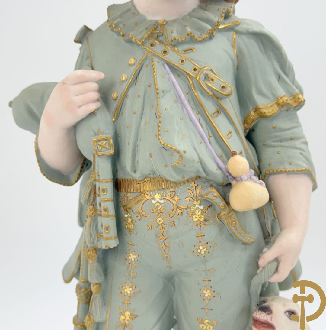 Paar grote Franse gekleurde biscuits van meisje en 
 jongen met schaap en geit