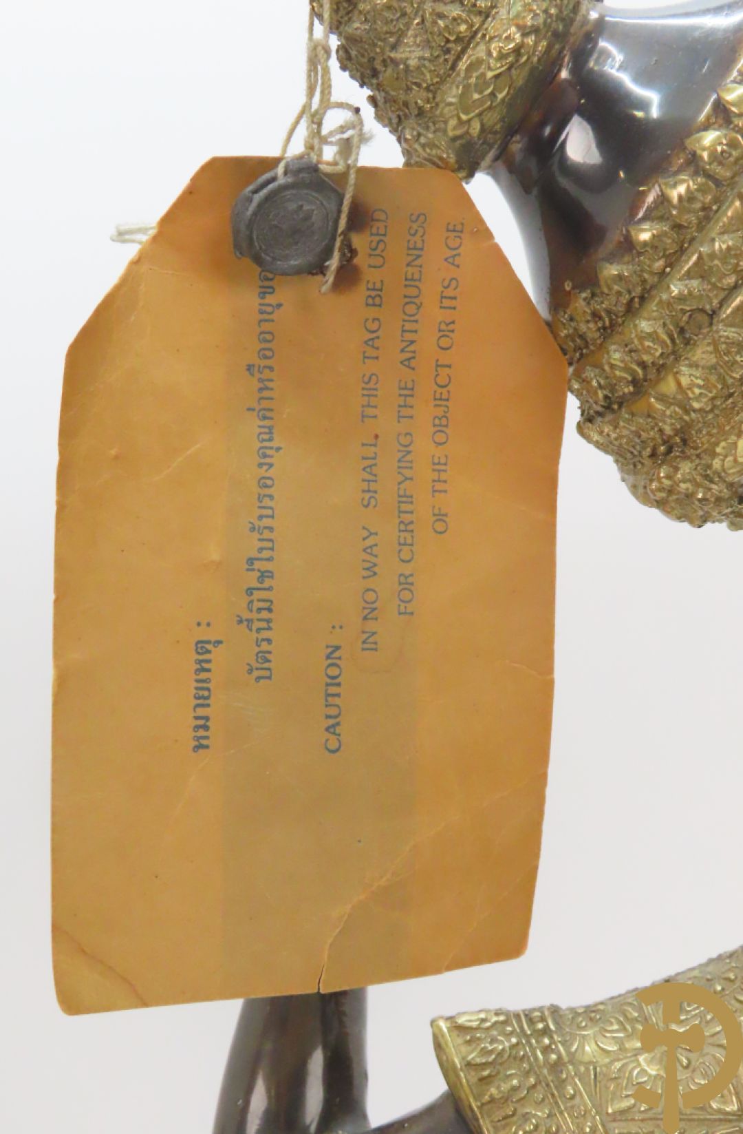 Twee staande koperen boedhistische figuren