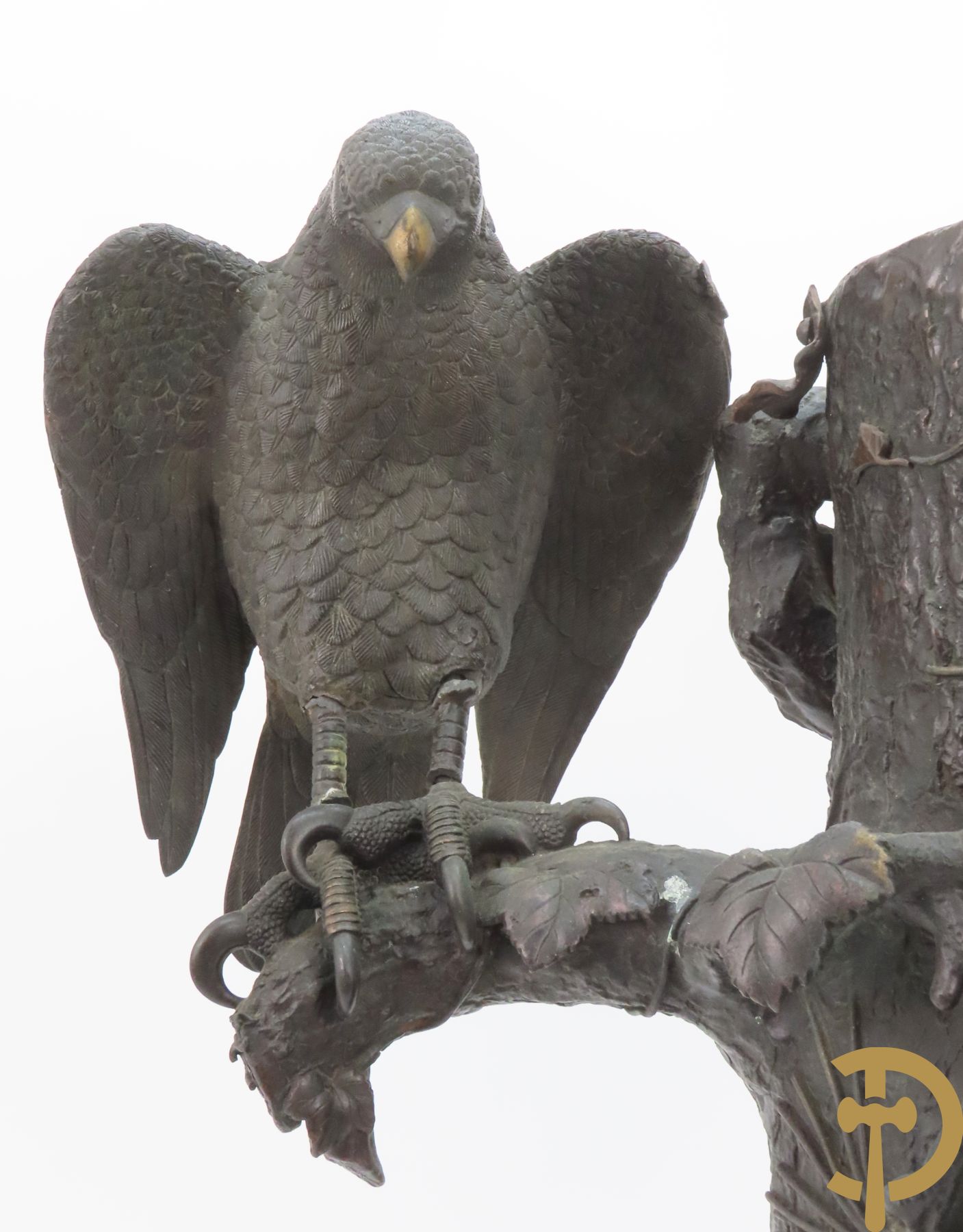 Bronzen ornament van boomstronk met takken en adelaar