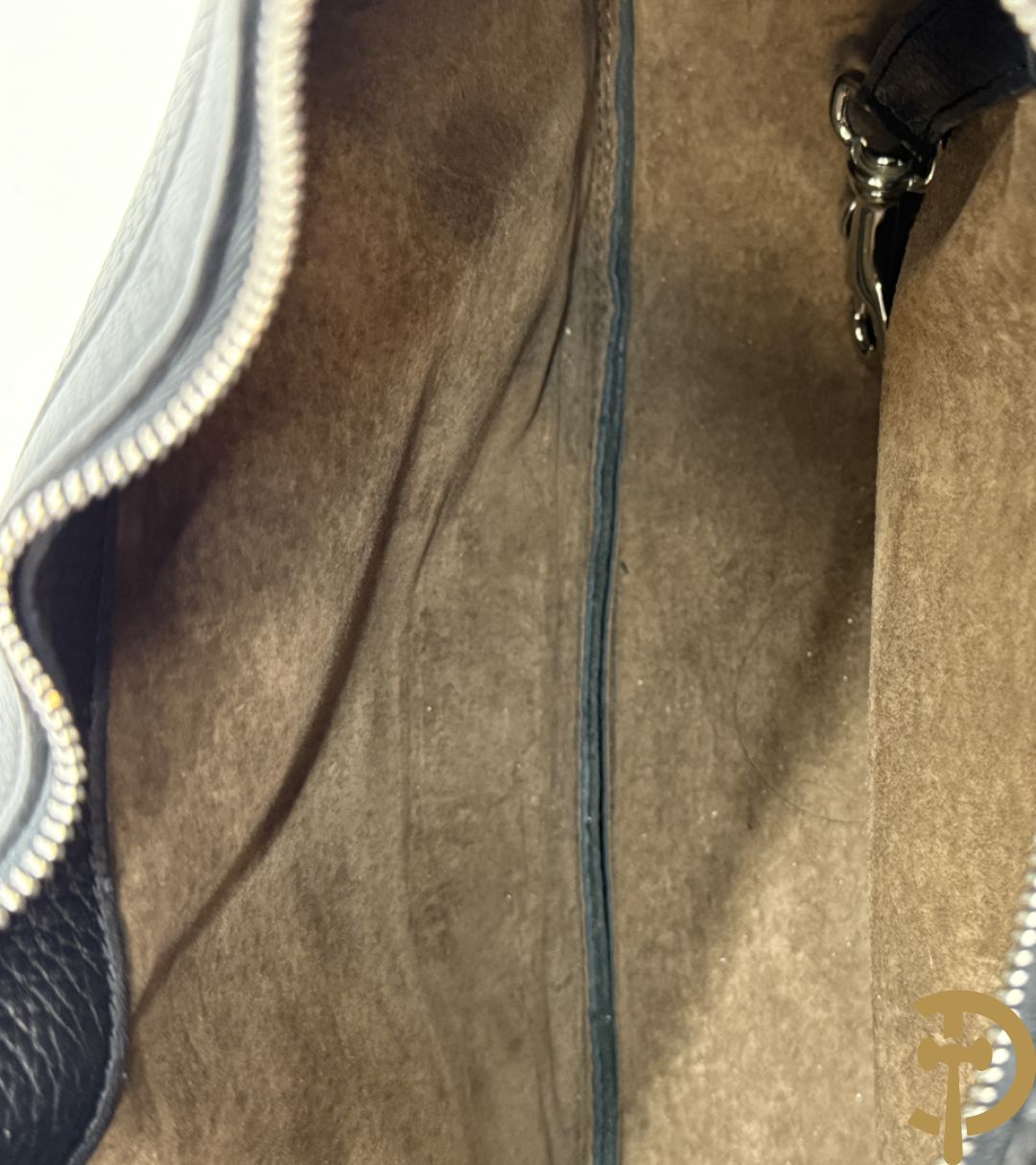 Bruine en zwart lederen handtas Delvaux + boek van Delvaux met documentatie