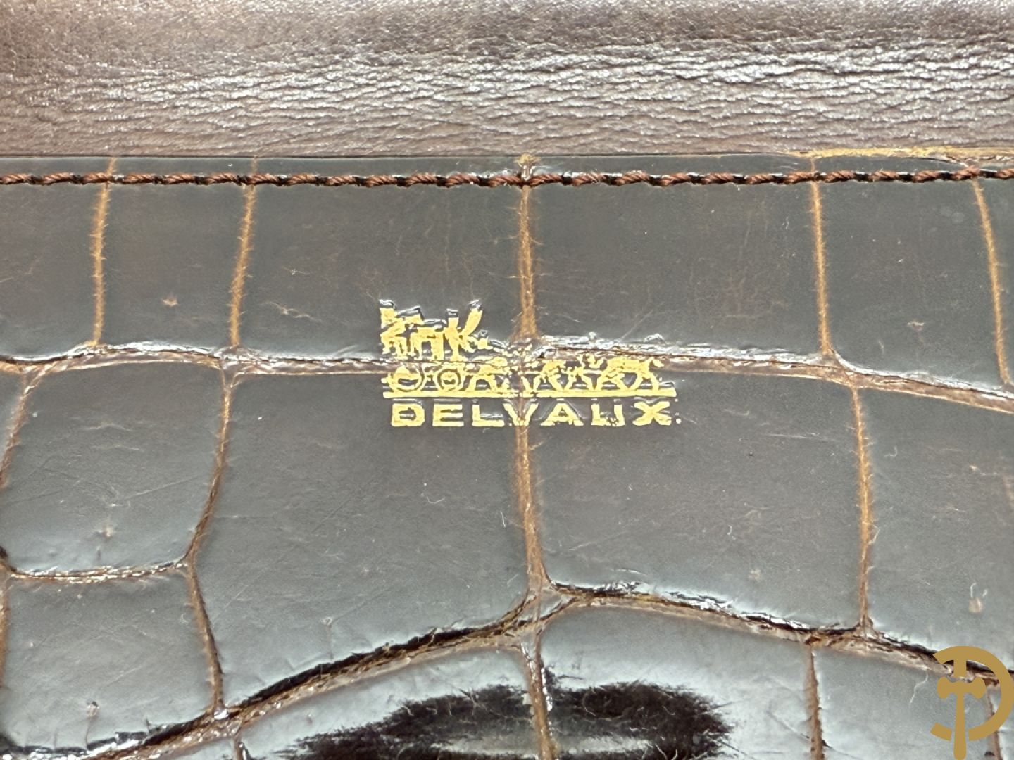 Vintage Delvaux handtas in kroko in bijhorende zak