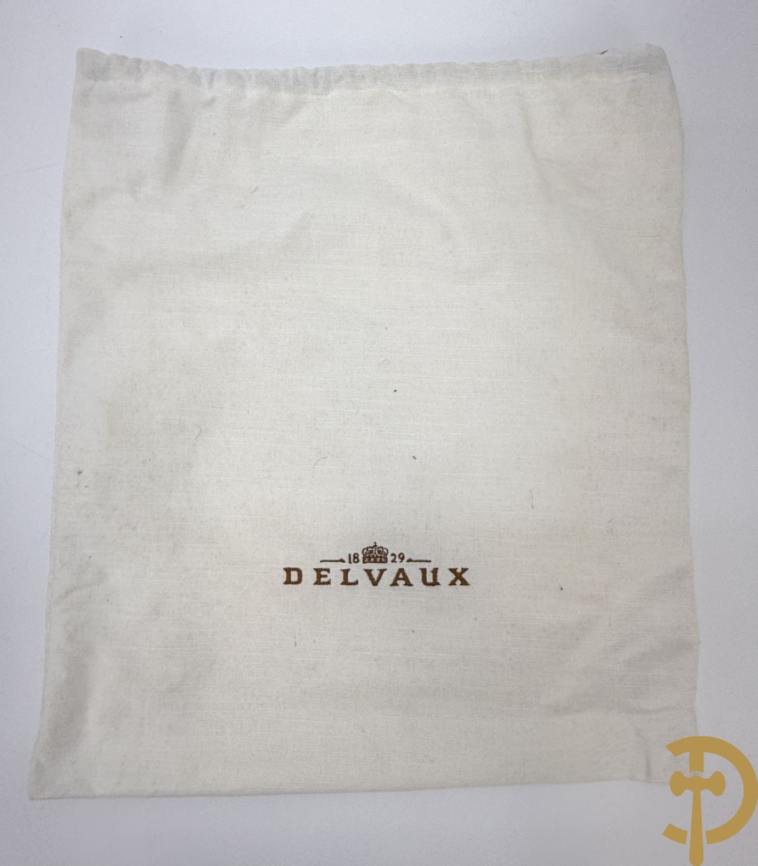 Mooi lederen auberginekleurige handtas Delvaux met bijhorende zak