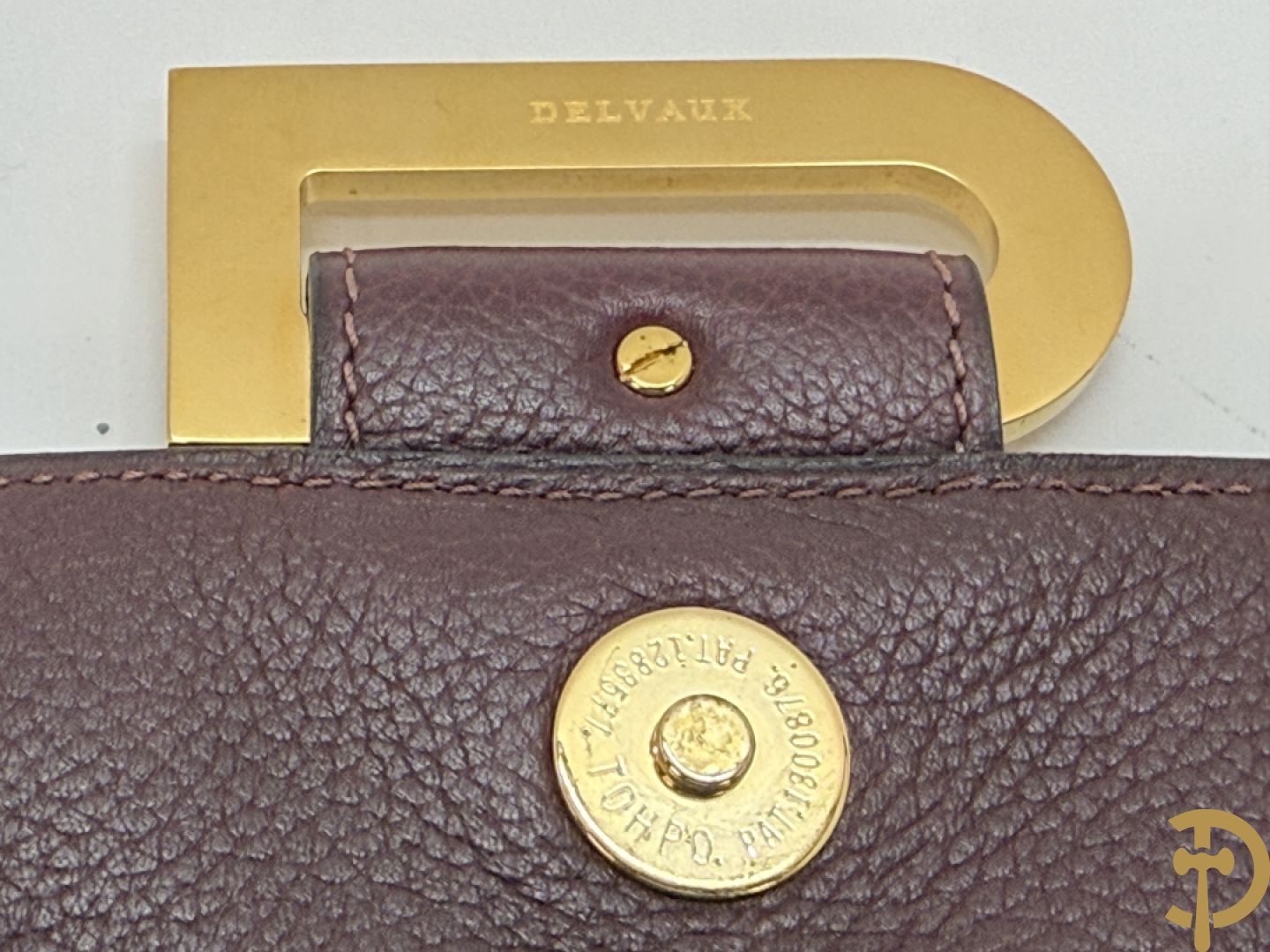 Mooi lederen auberginekleurige handtas Delvaux met bijhorende zak