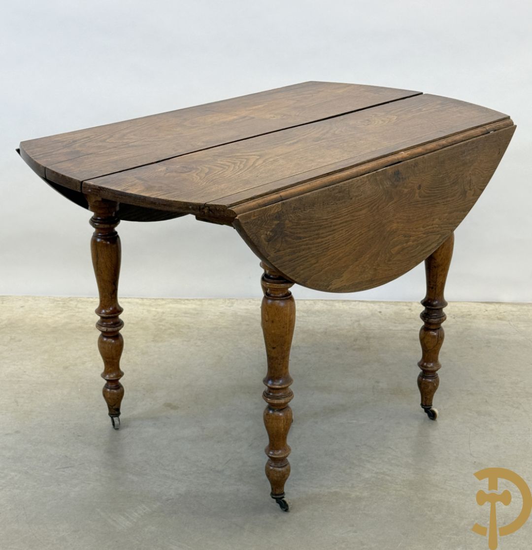 Eiken uittrekbare coulissetafel op 6 uittrekbare poten