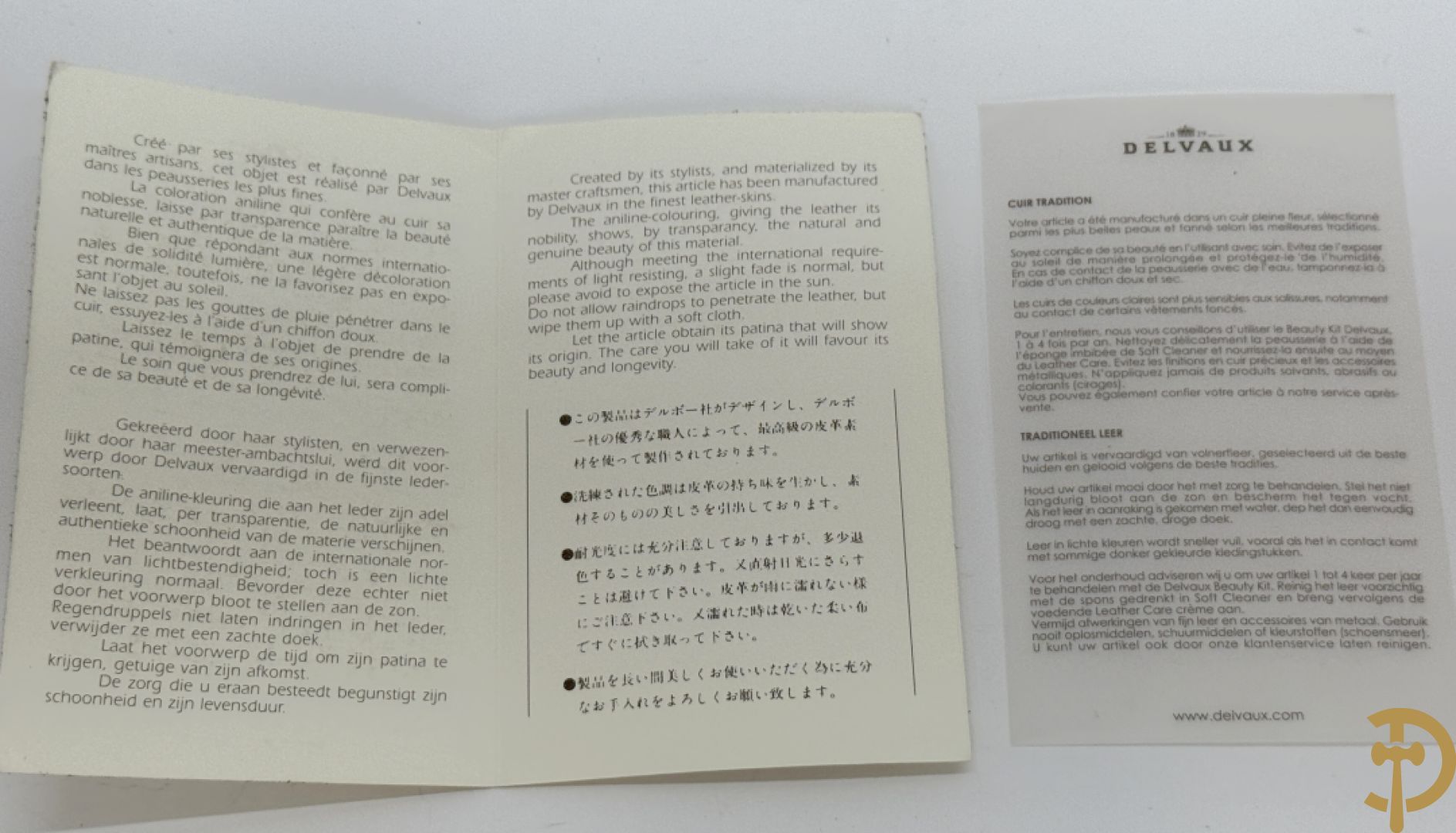 Bruine en zwart lederen handtas Delvaux + boek van Delvaux met documentatie